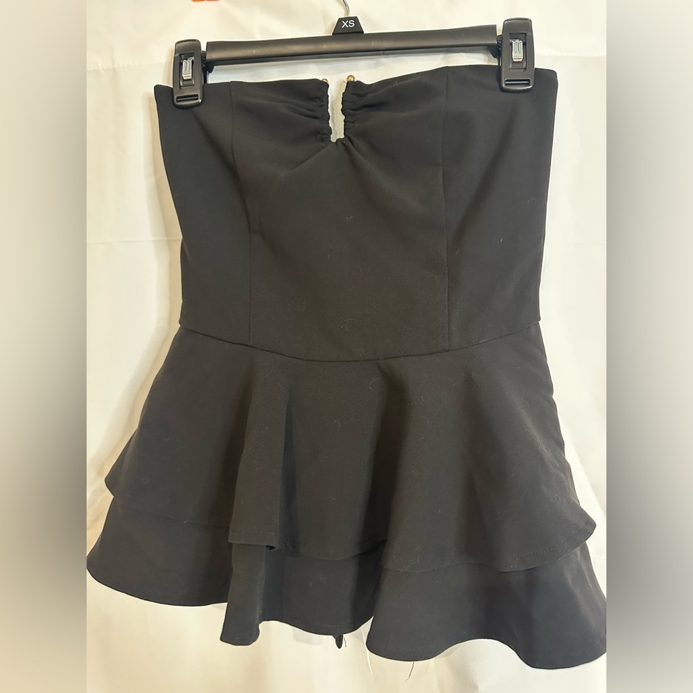 bebe Black peplum top with Ruffle Detail